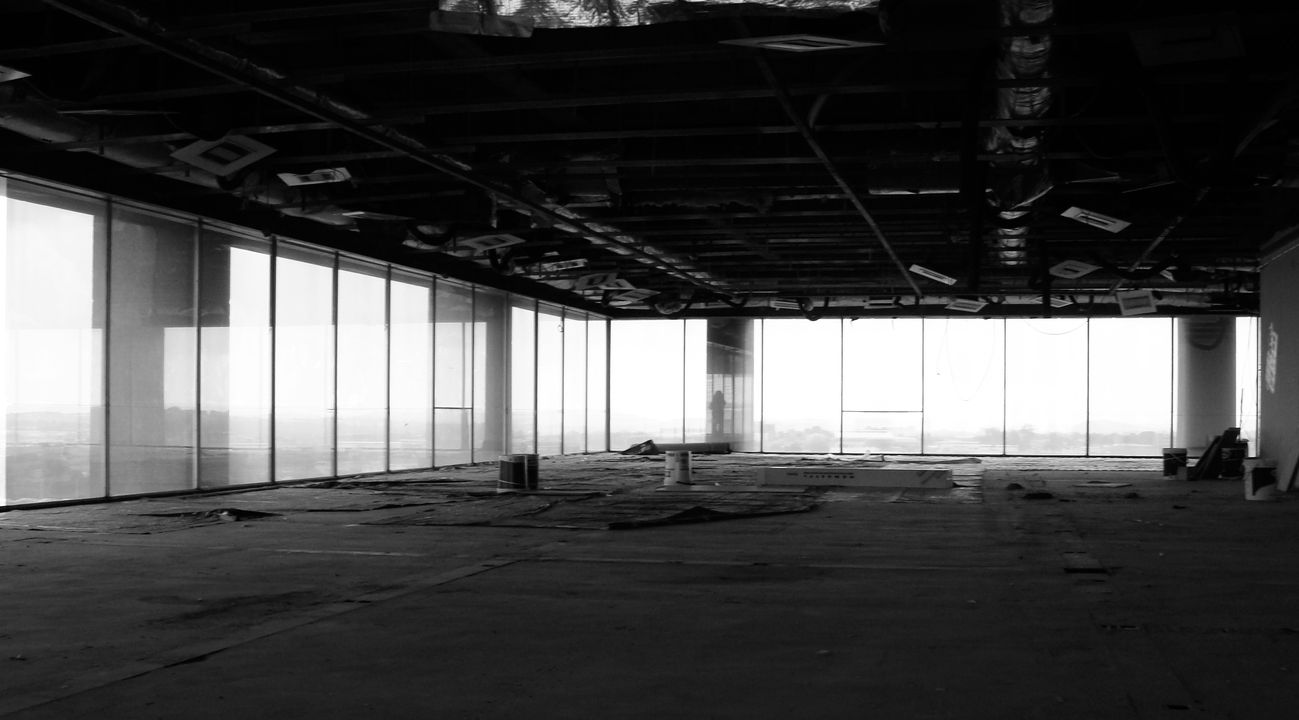 Open commercial floor stripped back for restoration